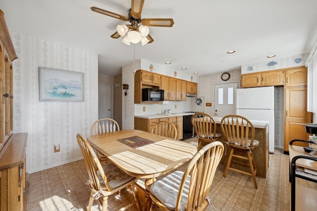 dining room featuring light floors, recessed lighting, ceiling fan, baseboards, and wallpapered walls