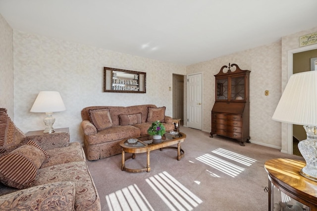 living area with light carpet and wallpapered walls