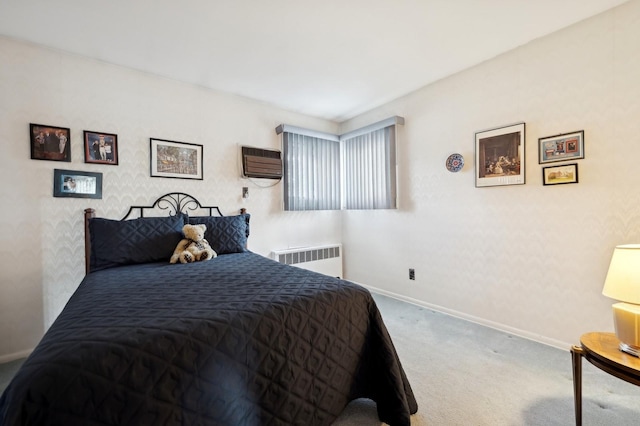 bedroom with baseboards, carpet flooring, and radiator