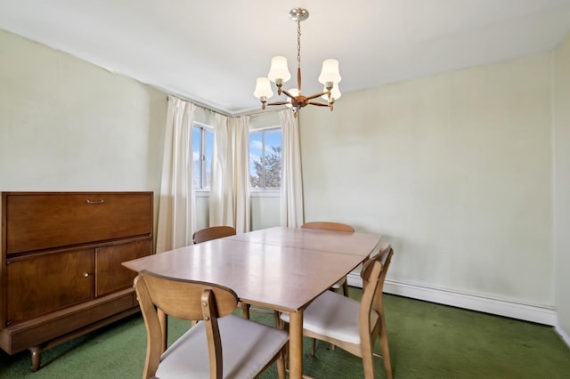 dining area with an inviting chandelier, baseboards, a baseboard heating unit, and dark colored carpet