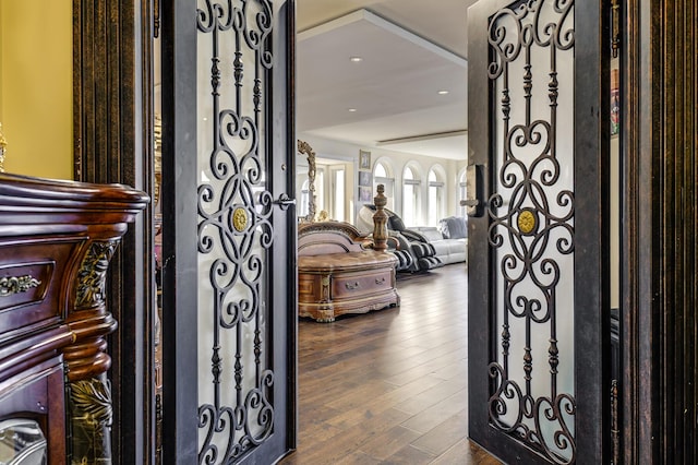 entryway with dark wood-style floors