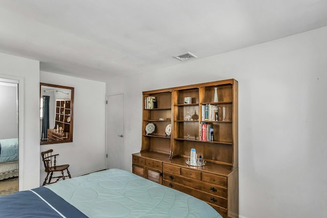 bedroom with visible vents