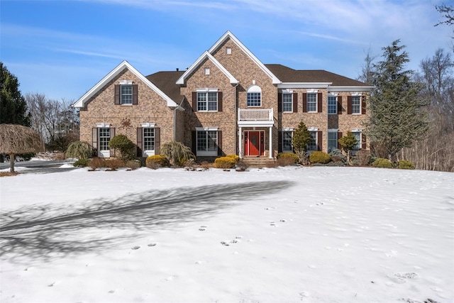 view of front of property featuring brick siding