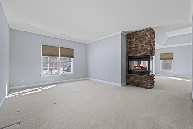 unfurnished living room featuring light carpet, a stone fireplace, and crown molding