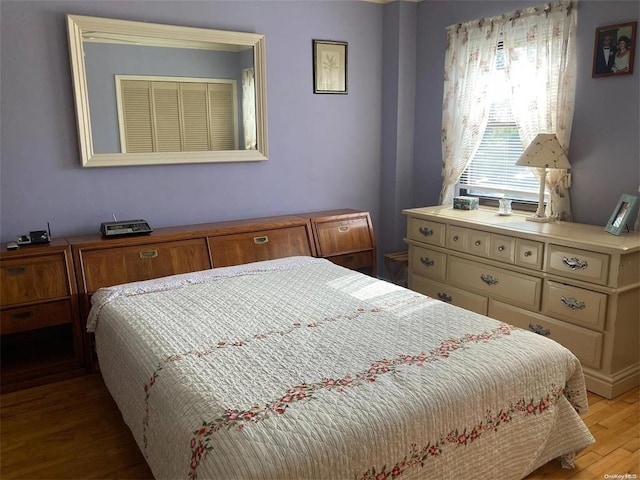 bedroom with light wood-style flooring