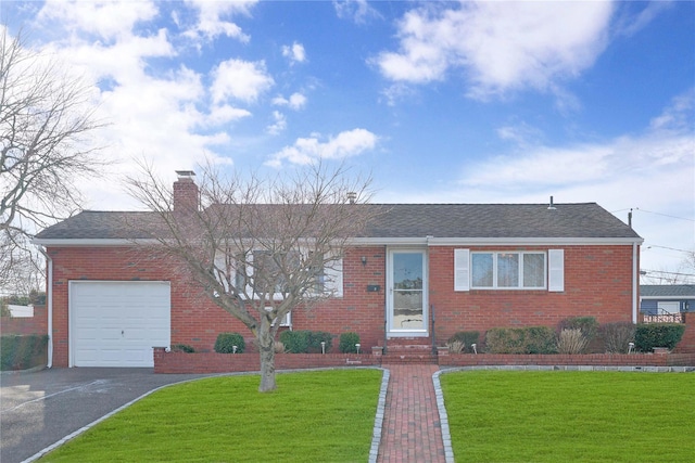 ranch-style house with a garage, brick siding, and a front lawn