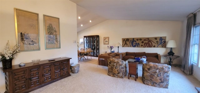 living area with lofted ceiling, carpet, and recessed lighting