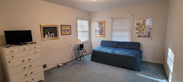 sitting room featuring carpet, visible vents, and baseboards