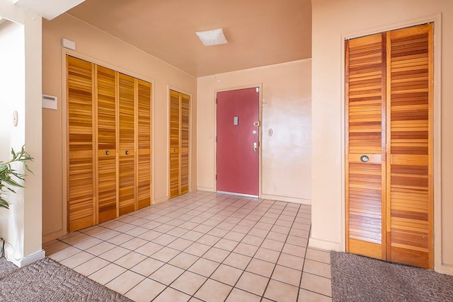 interior space featuring light tile patterned flooring