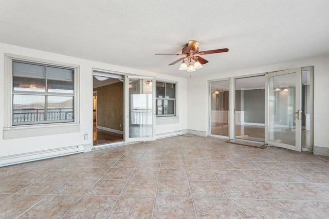 interior space featuring baseboard heating and a ceiling fan