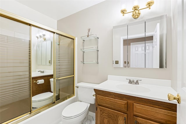 full bath featuring shower / bath combination with glass door, vanity, and toilet