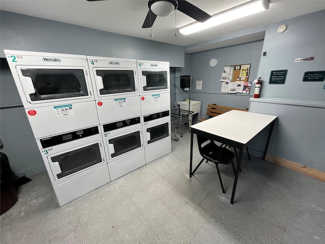 kitchen featuring stacked washer / dryer, washing machine and dryer, white cabinets, and ceiling fan