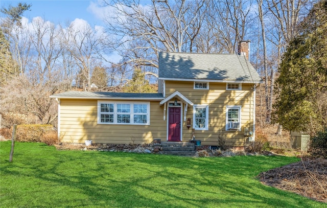 view of front of home with cooling unit, a chimney, and a front lawn