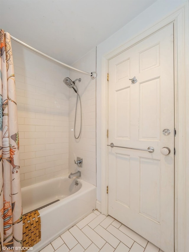 full bathroom featuring tile patterned flooring and shower / bath combo with shower curtain