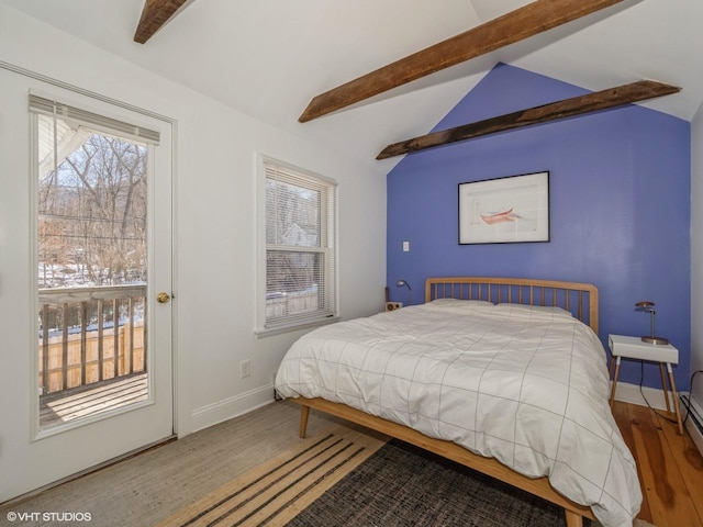 bedroom with vaulted ceiling with beams, wood finished floors, and baseboards