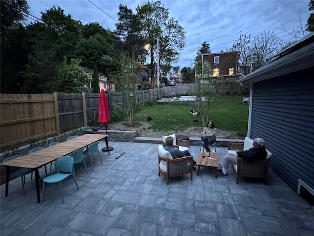 view of patio / terrace with outdoor dining area and a fenced backyard