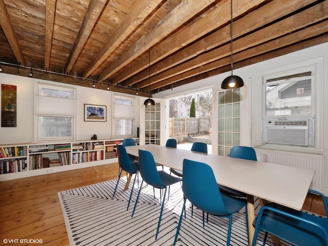 dining room with cooling unit, wood ceiling, beam ceiling, hardwood / wood-style floors, and rail lighting