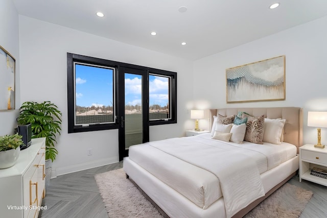 bedroom featuring recessed lighting and baseboards