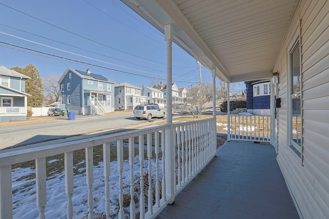 balcony with a residential view and a porch