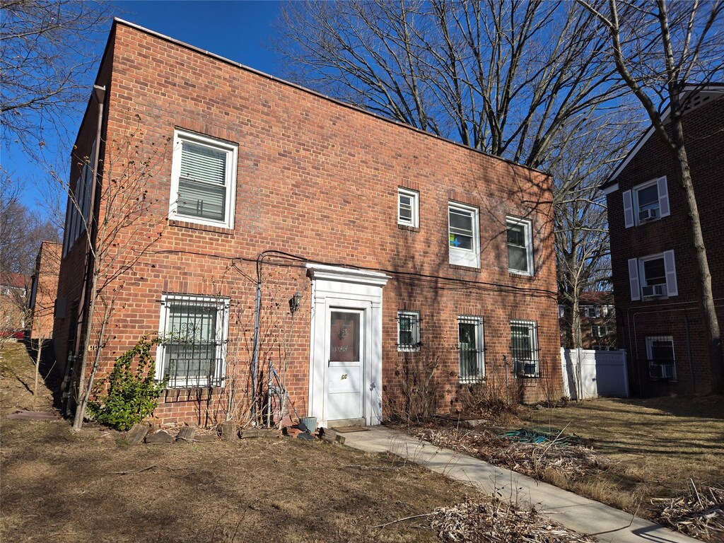 150-46 Village Rd Unit 99Gc, Briarwood, NY 11432 - view of front of home with brick siding