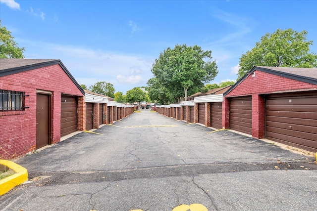 view of road with community garages