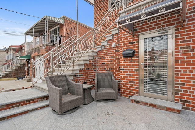 view of patio with stairway