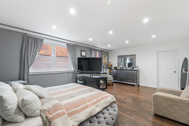 bedroom featuring dark wood-style floors, baseboards, and recessed lighting