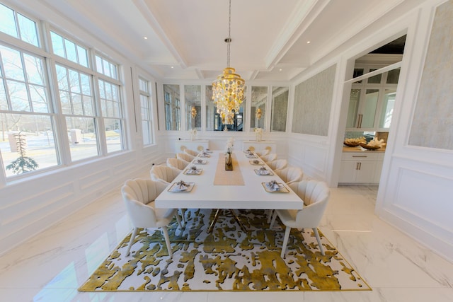 dining room featuring marble finish floor, beam ceiling, recessed lighting, a decorative wall, and an inviting chandelier