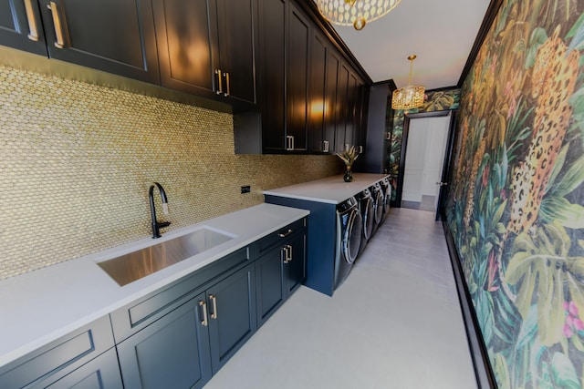 interior space with cabinet space, ornamental molding, and a sink