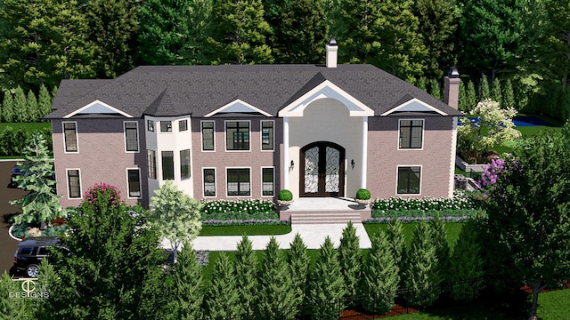 view of front of house with french doors, brick siding, and a chimney