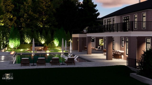 view of patio with a pool, a balcony, and grilling area