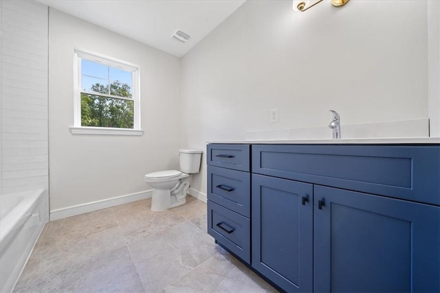 bathroom featuring toilet, baseboards, visible vents, and vanity