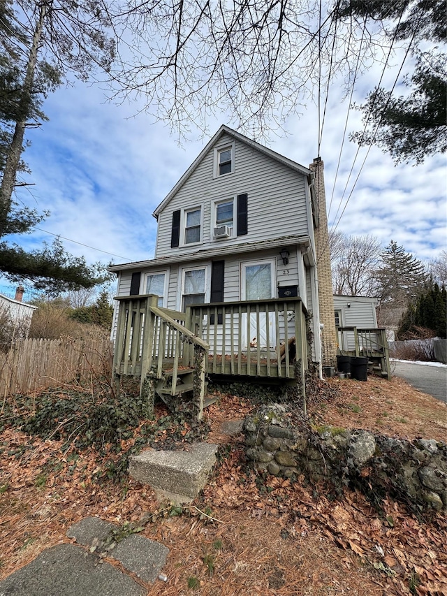 view of front of property featuring a chimney