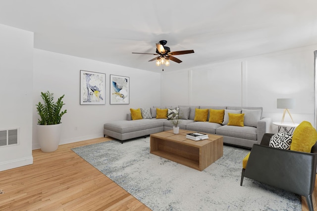 61 Surrey St, Rock Hill, NY 12775 - living area with wood finished floors, ceiling fan, and baseboards
