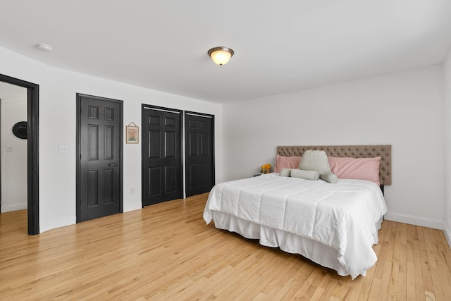 61 Surrey St, Rock Hill, NY 12775 - bedroom featuring light wood-type flooring and baseboards