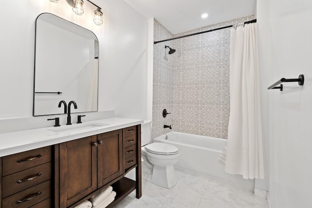 bathroom featuring toilet, marble finish floor, vanity, and shower / tub combo with curtain