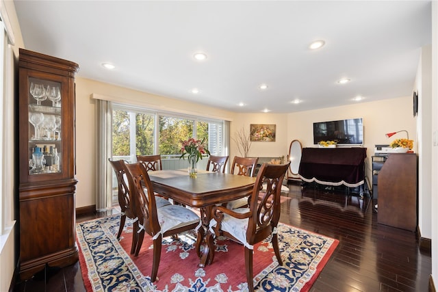 dining area featuring dark wood-style floors and recessed lighting