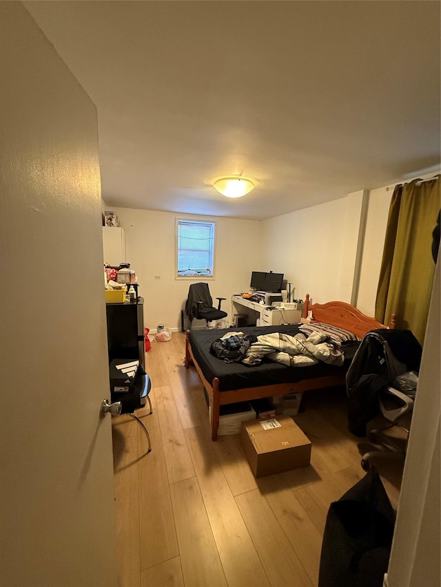 bedroom featuring light wood-type flooring