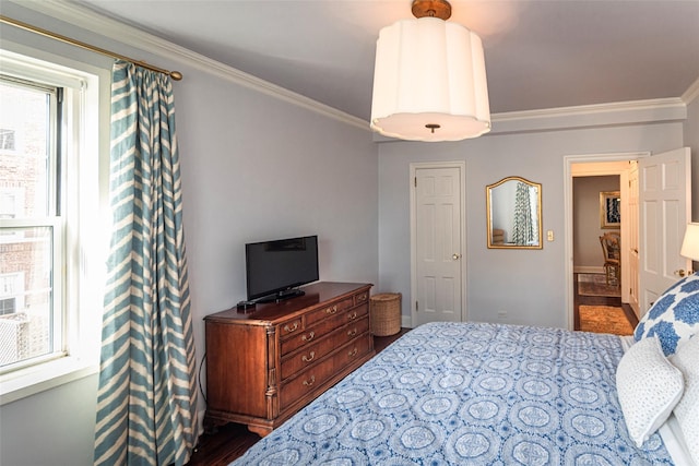 bedroom with crown molding