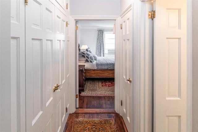 corridor featuring wood finished floors