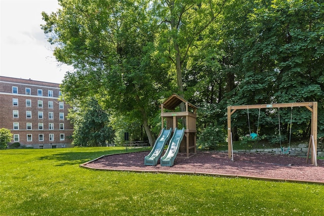 community play area with a lawn