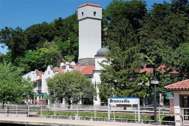 view of property's community with fence