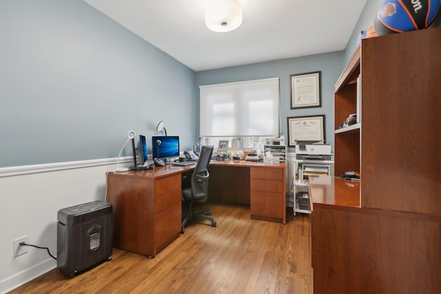 home office featuring light wood-style flooring