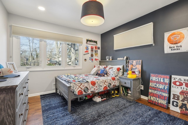 bedroom featuring dark wood-style flooring, recessed lighting, and baseboards