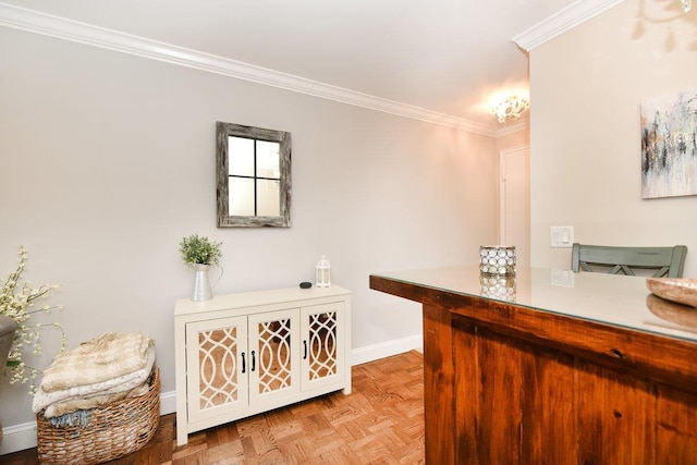 interior space featuring ornamental molding and baseboards