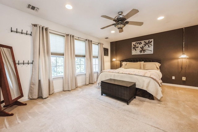 bedroom with baseboards, visible vents, carpet flooring, and recessed lighting