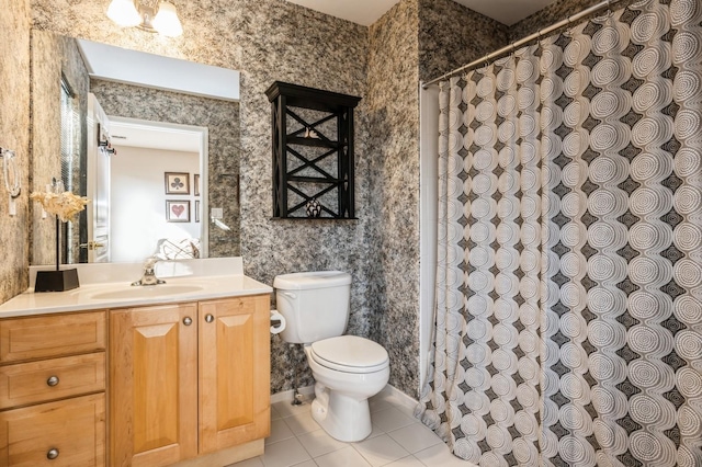 full bathroom featuring wallpapered walls, toilet, tile patterned floors, curtained shower, and vanity