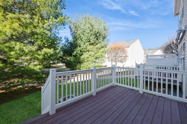 deck featuring a yard