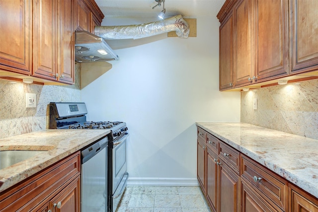 kitchen with brown cabinets, island range hood, light stone counters, and stainless steel appliances