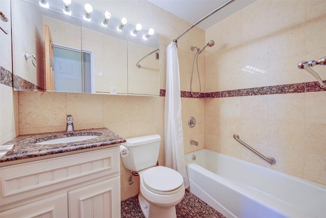 bathroom with tile walls, tasteful backsplash, toilet, shower / bath combo with shower curtain, and vanity